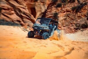 Put These 9 East Zion Adventures On Your Spring Bucket List 8 a truck that is sitting on a rock