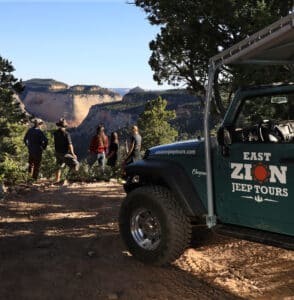 23 Zion Adventures for 2023 2 A Jeep and people overlooking Checkerboard Mesa