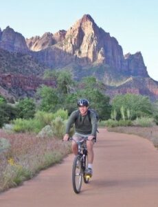 Zion National Park’s Best End-of-Year Hikes 2 bicyclist on Pa'rus Trail in Zion National Park