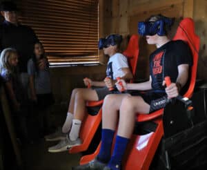 a group of people playing virtual reality