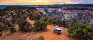A jeep driving through East Zion