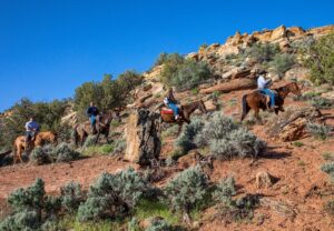 People riding horses near Zion National Park