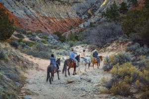people riding horseback in east zion