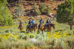 People riding horses in Kanab Utah