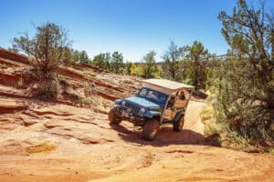 A jeep on red rock