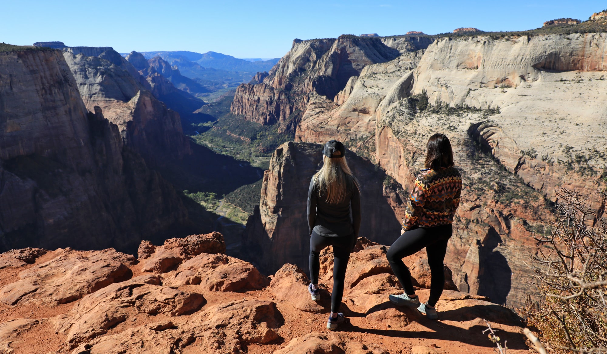 Two women hiking at Observation Point