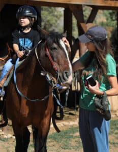 Kid-Friendly East Zion Adventures 4 Child on horseback at Zion Ponderosa