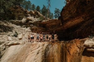 People at hidden creek waterfalls in East Zion