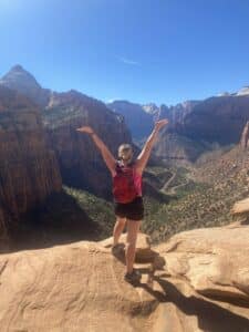 A women practicing responsible adventure in Zion National Park