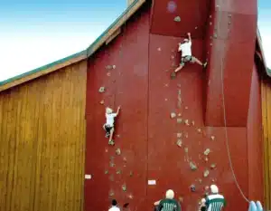 People on a climbing wall